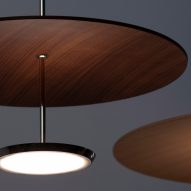Close up of Pablo Design's Sky Dome pendant light with a pressed wood shade