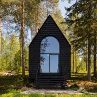 Black woodland cabin