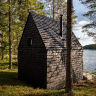 Black lakeside cabin