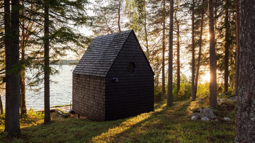 A black cabin in Finnish woodland