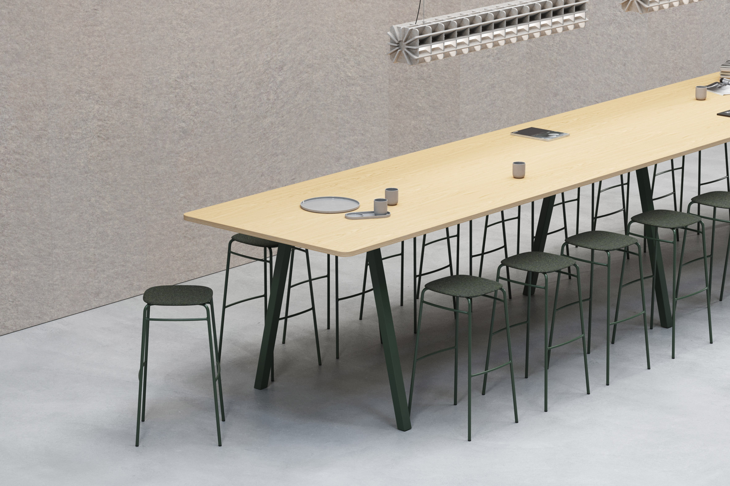 Green stools by De Vorm around a long office table