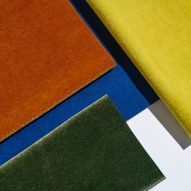 Dedar's Vladimiro velvet laid out in sheets of different colours including yellow, orange and green