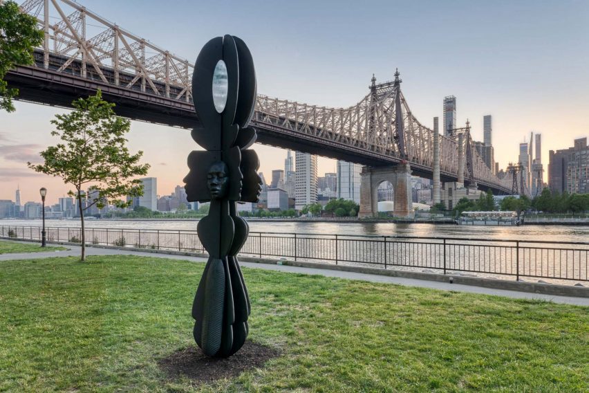 An obelisk like sculpture was placed in front of the Brooklyn Bridge