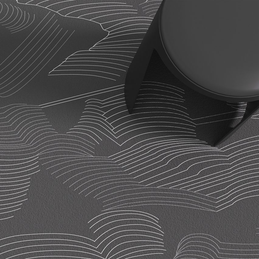 Foto diambil dari atas karpet 3D, yang dipresentasikan di Dezeen Showroom, dengan bangku hitam