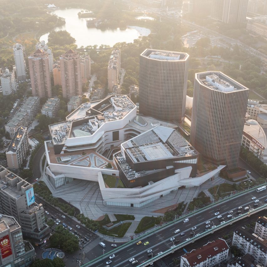A photograph of the Shanghai Jiuguang Center, which is made up to blocks of different shapes and materials