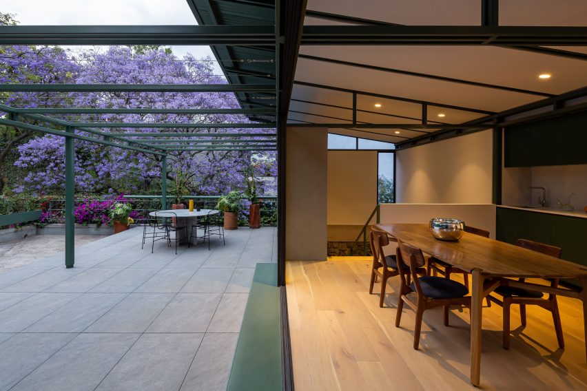 A dining room opening out onto a terrace
