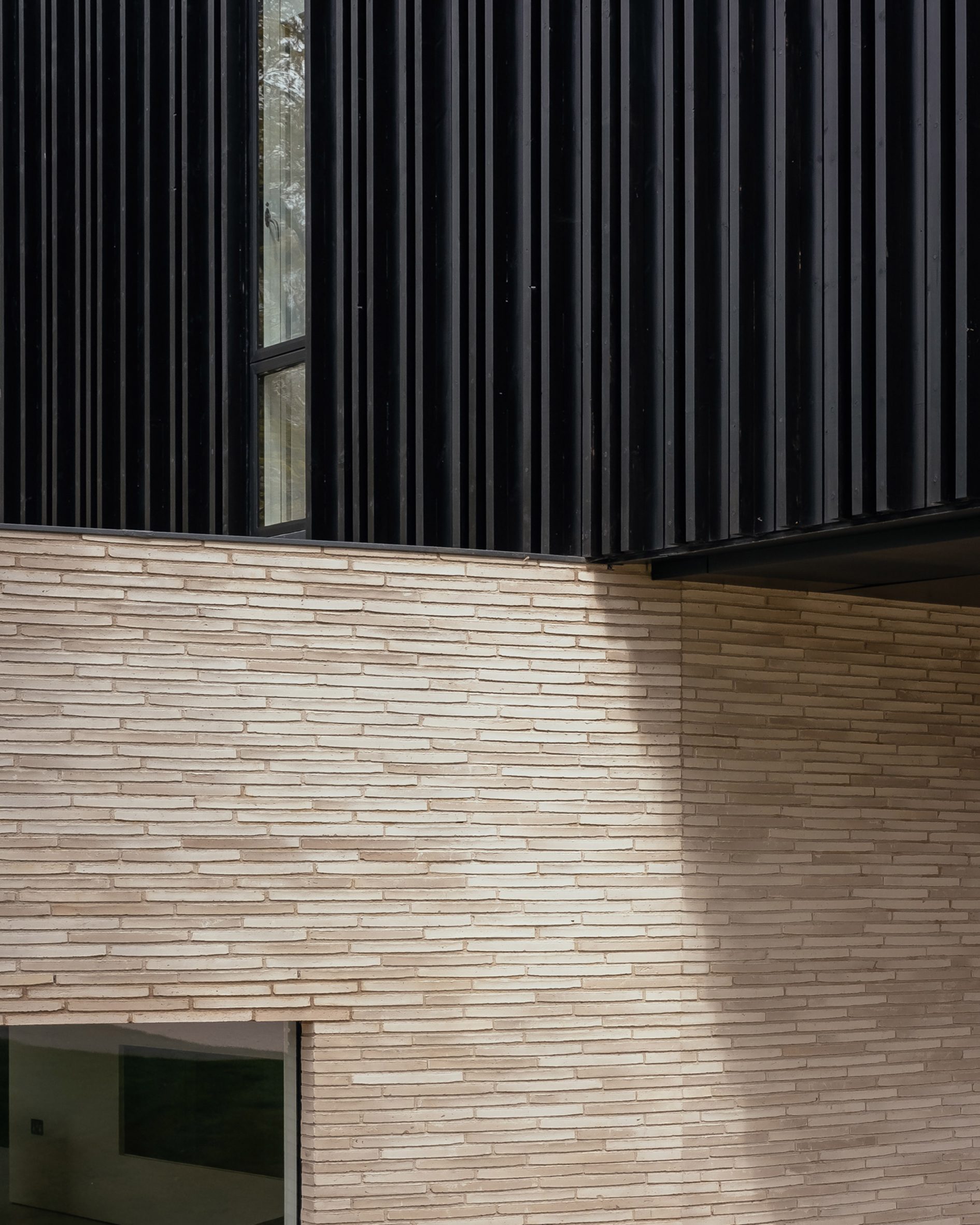 Brickwork and timber cladding of Claywood house for a wheelchair user by Ayre Chamberlin Gaunt