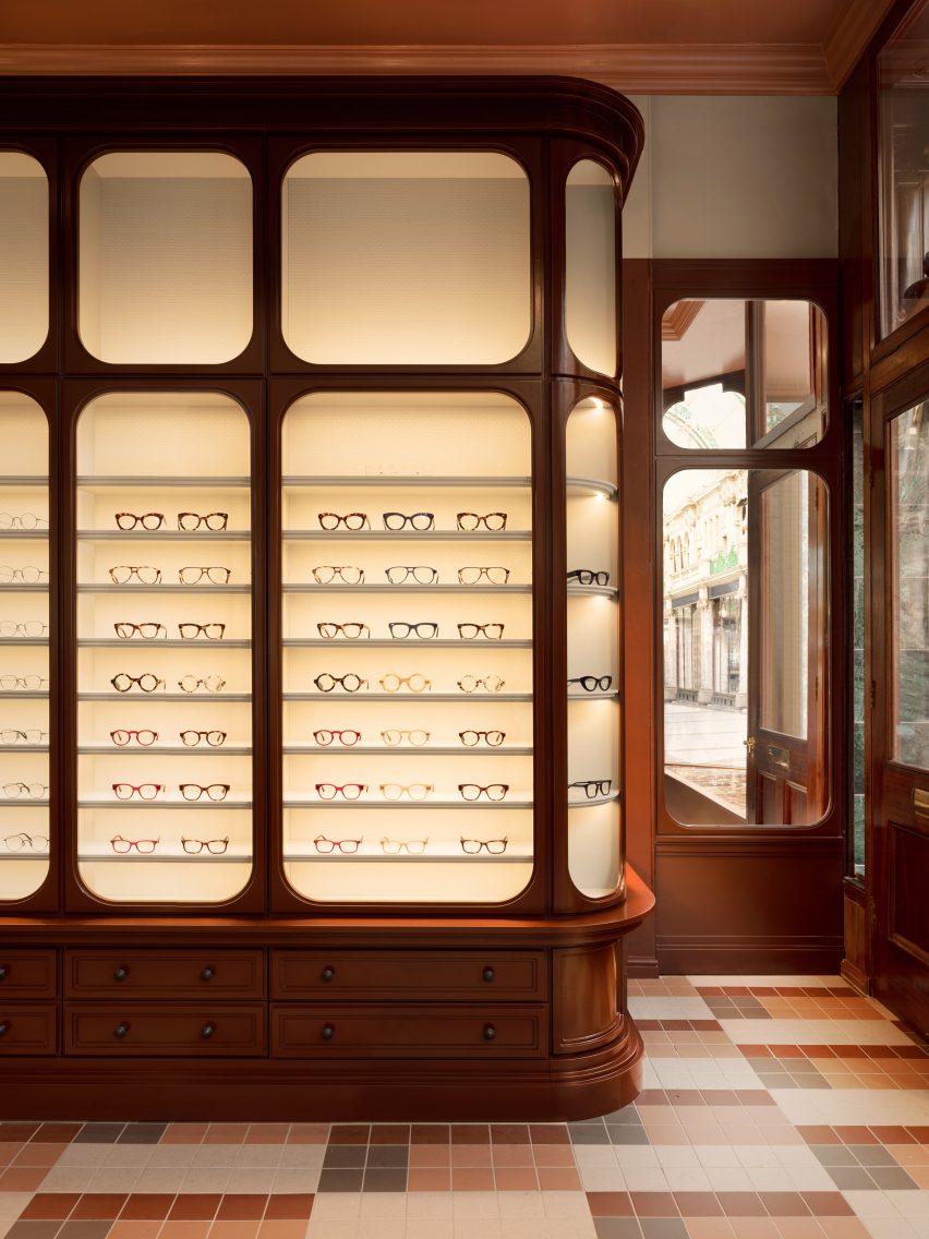 Glass displayed in backlit Victorian-style cabinetry in Cubitts store in Leeds