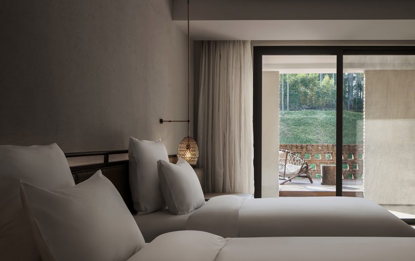 اتاق خواب در هتل دانگفنگیون Mi'Le توسط چنگ چانگ دیزاین