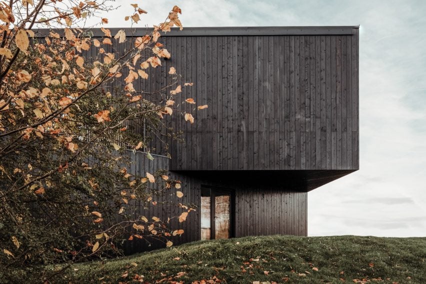 The black timber exterior of Falcon House
