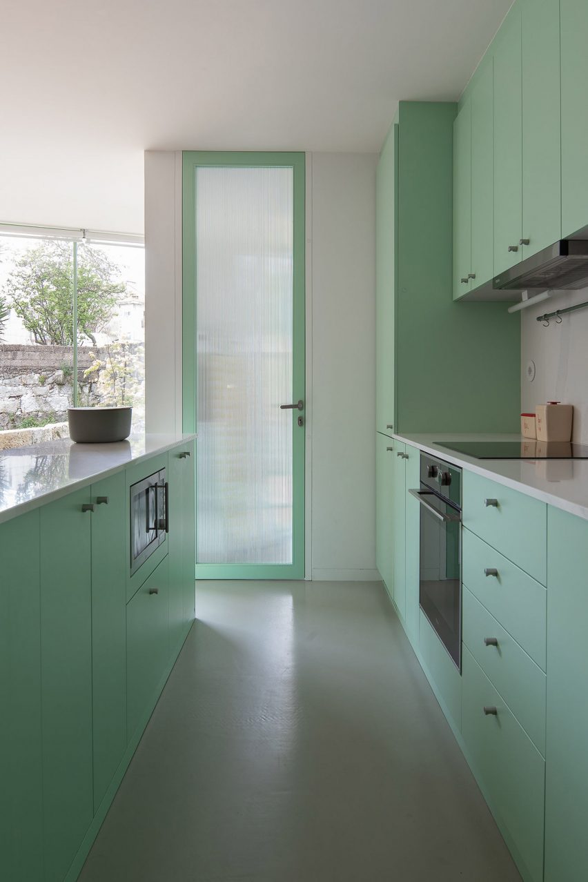 Turquoise kitchen in Portuguese house
