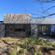 Set Ideas extends Fluid House in Argentina using glass and steel