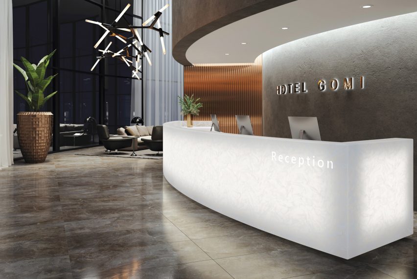 Aurora Cotton surfacing used to form counter in Hotel Gomi reception