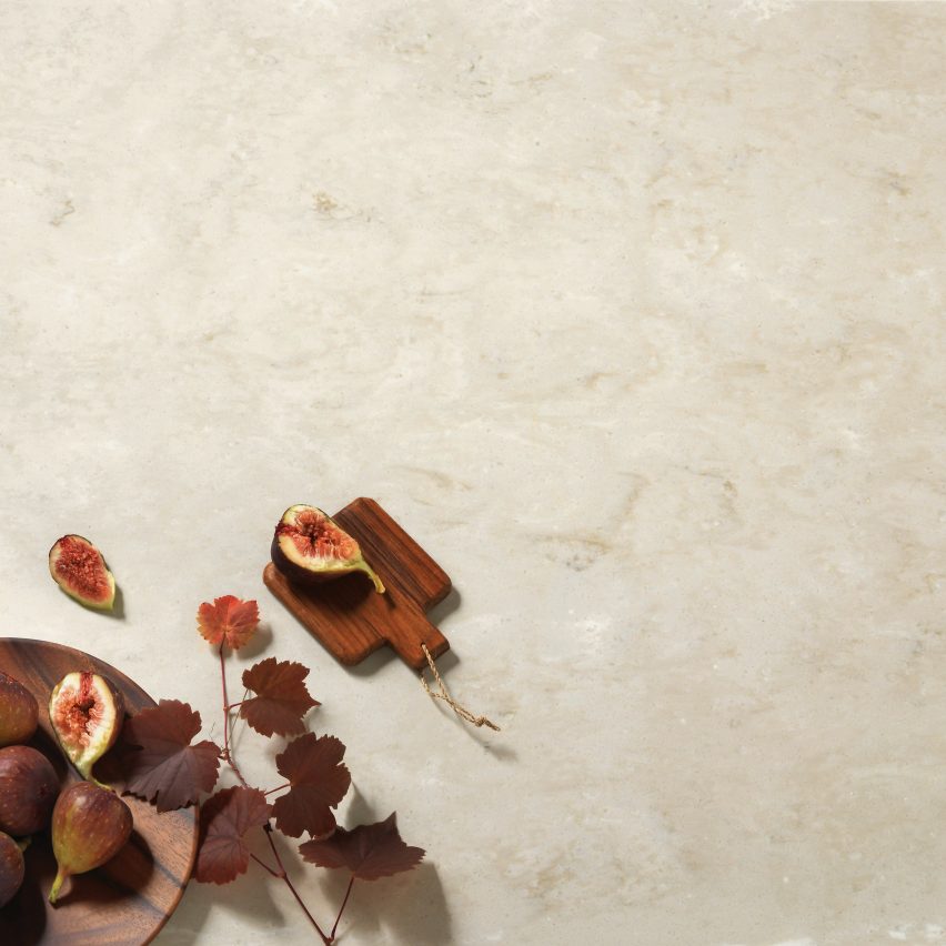 Beige marble- effect finish Aurora Bisque by HI-MACS with figs displayed on top