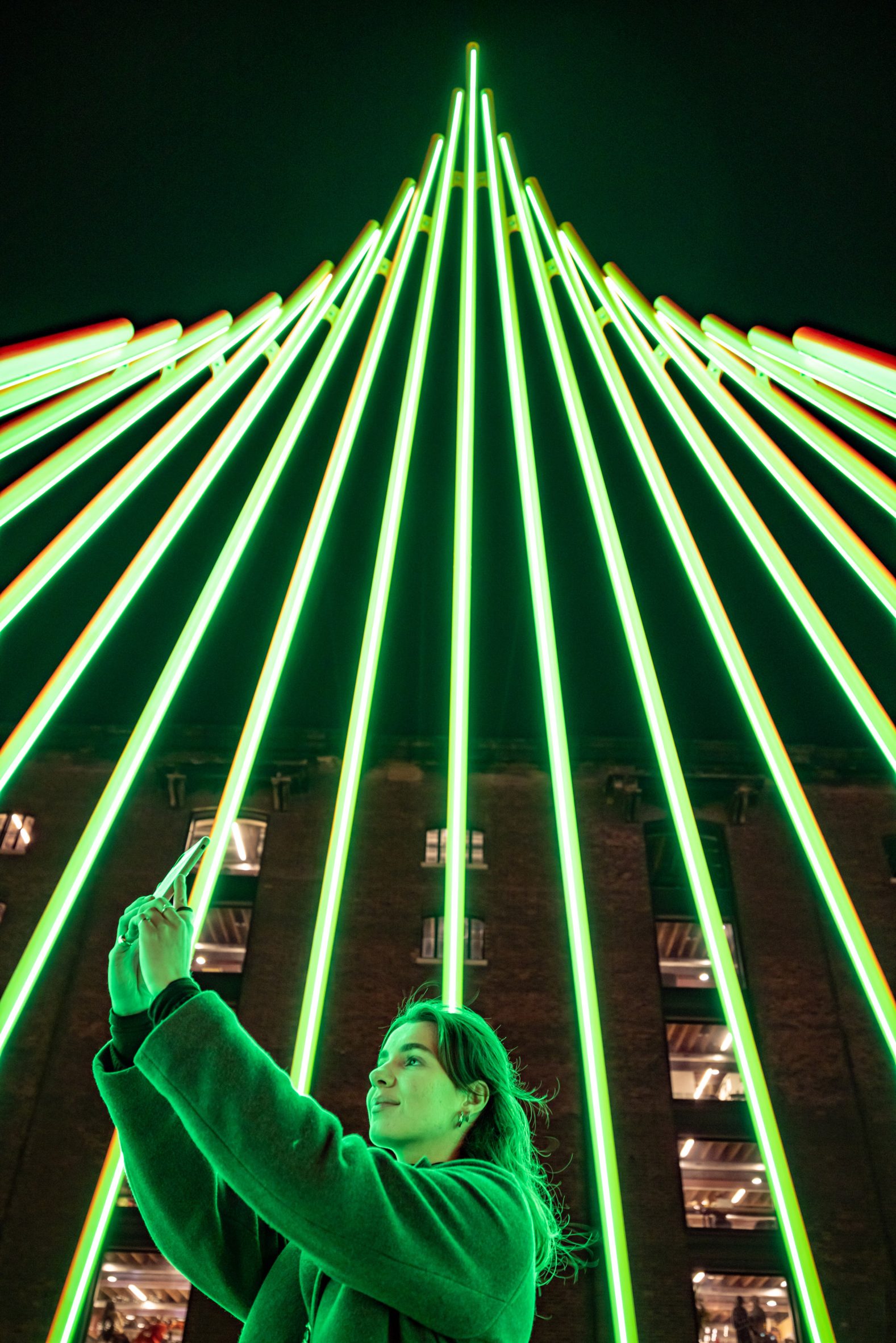 A person pictured inside the green glowing Temenos