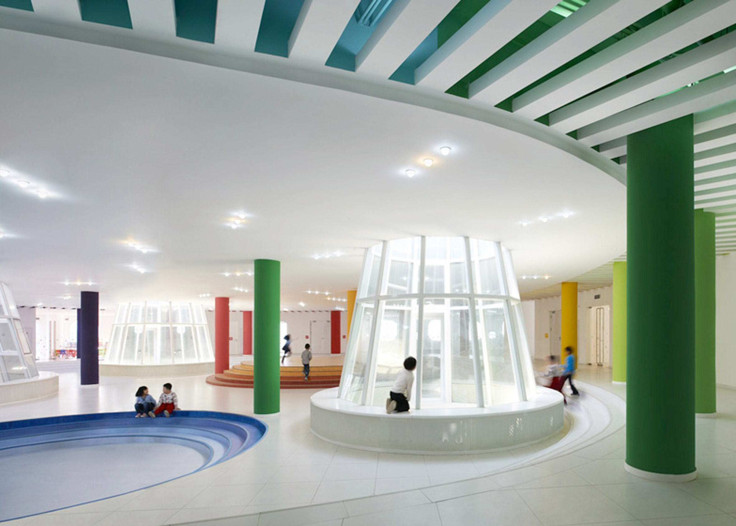 Multicoloured columns inside a kindergarten