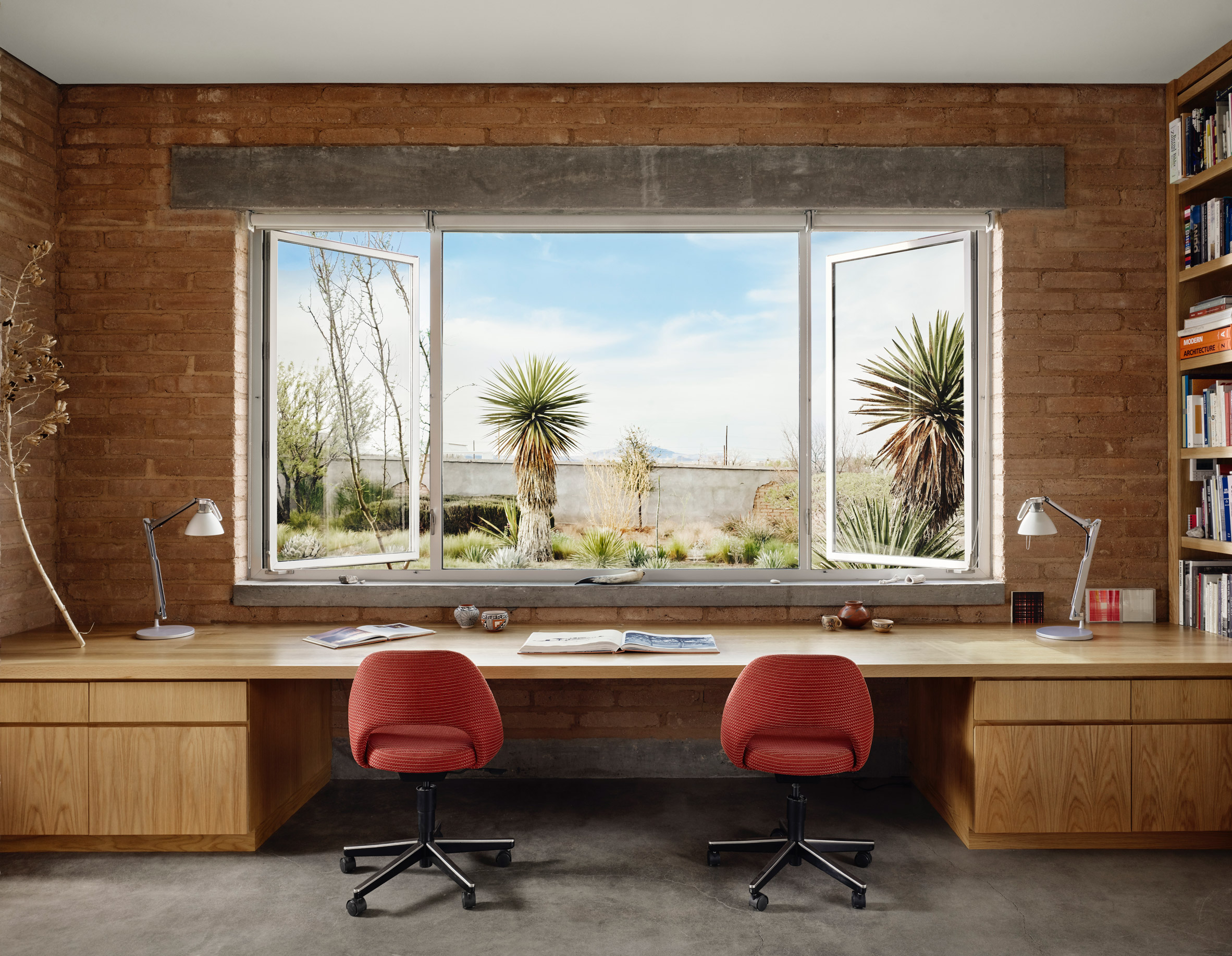 A double window above a desk in Marfa Studio