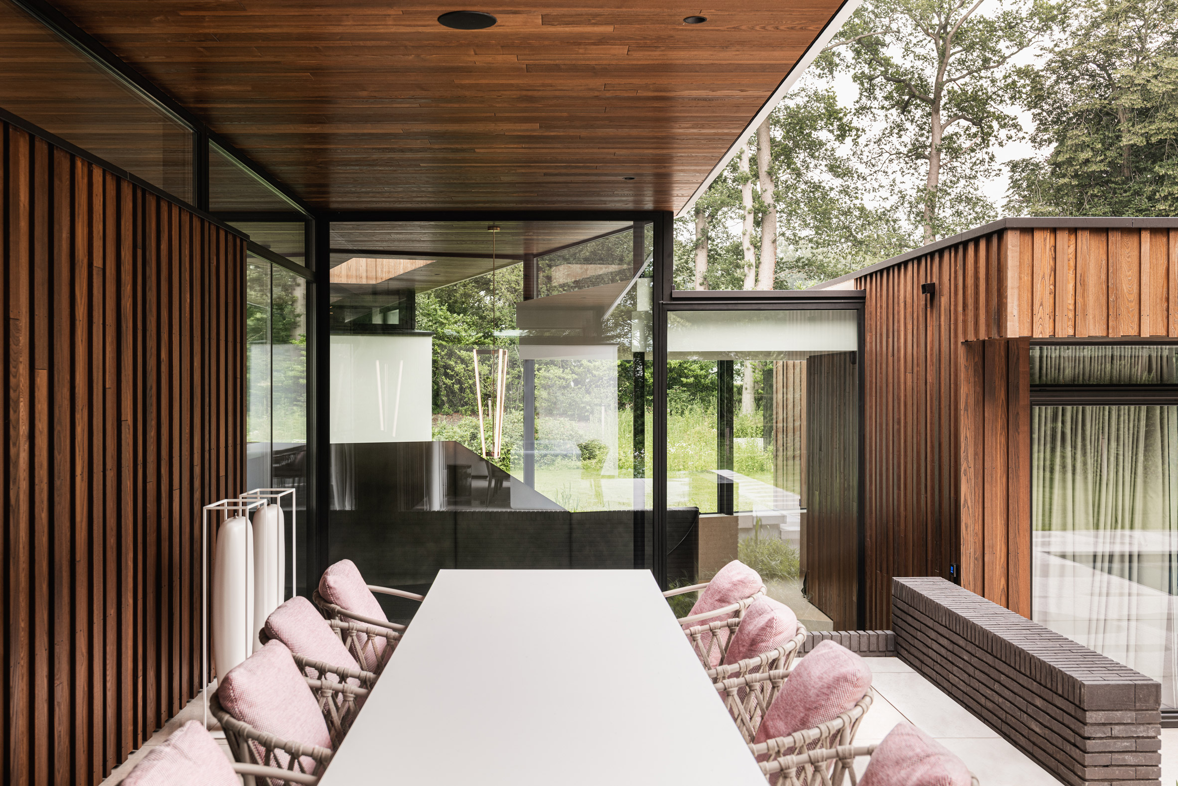 Exterior terrace of Modern House by the River by Maas Architecten