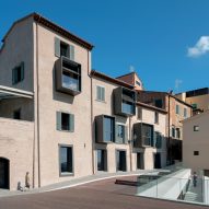 Cantilevered terrace adjoins 14th-century townhouses overhauled by Mario Cucinella Architects