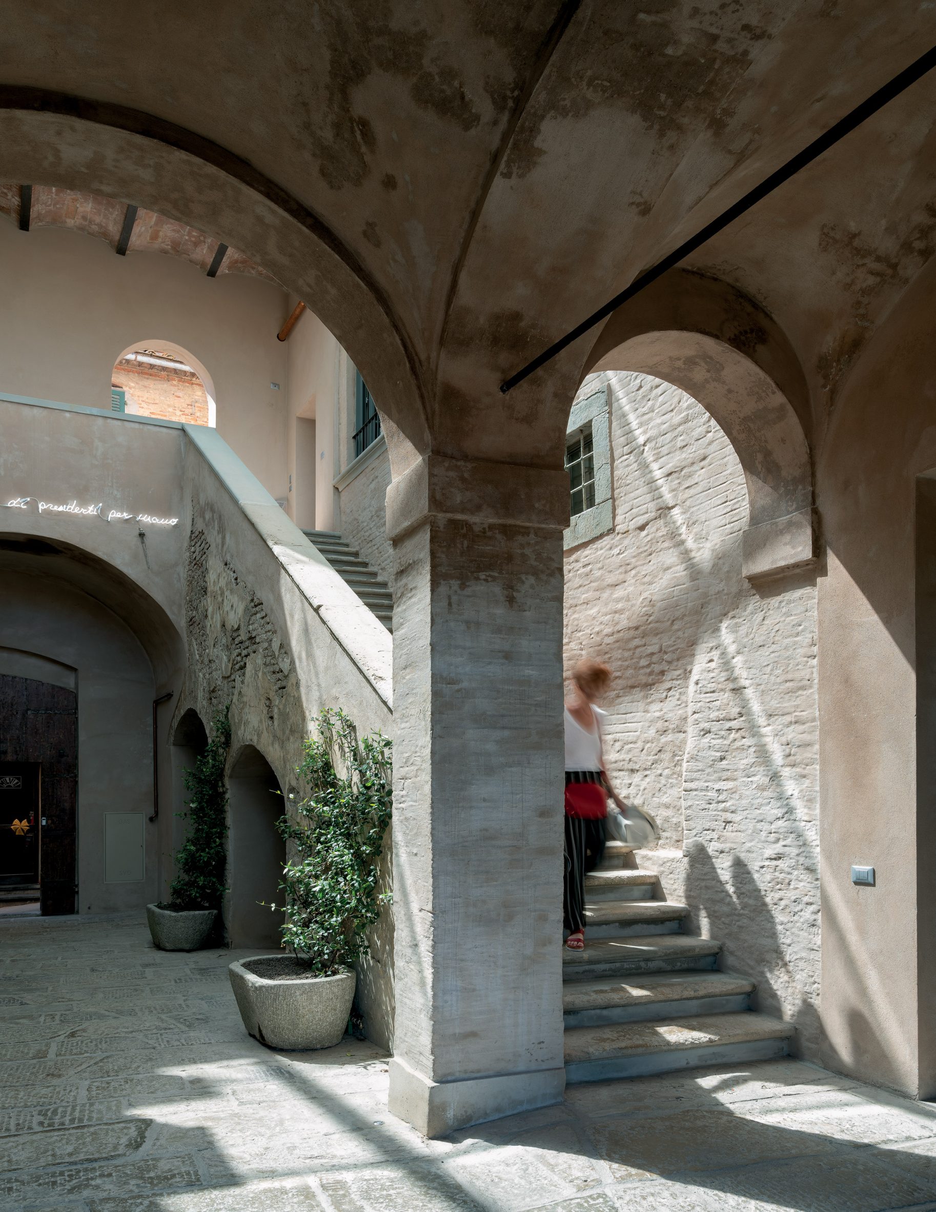 A stone staircase is pictured at Palazzo Senza Tempo