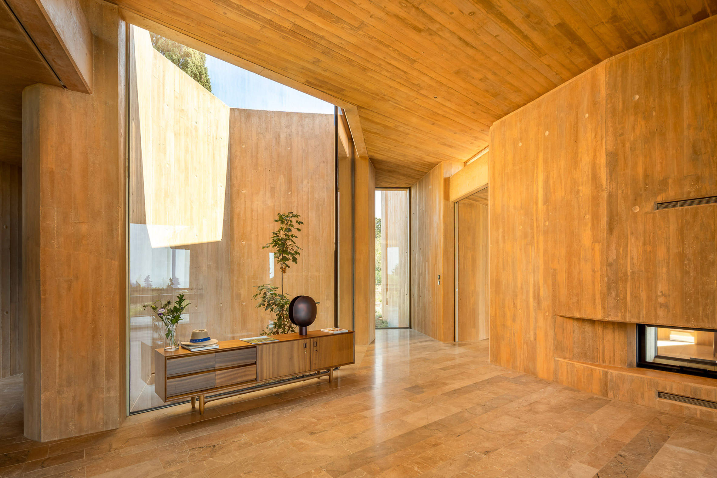 Living space in Villa 19 at Palmares Ocean Living & Golf resort by RCR Architectes