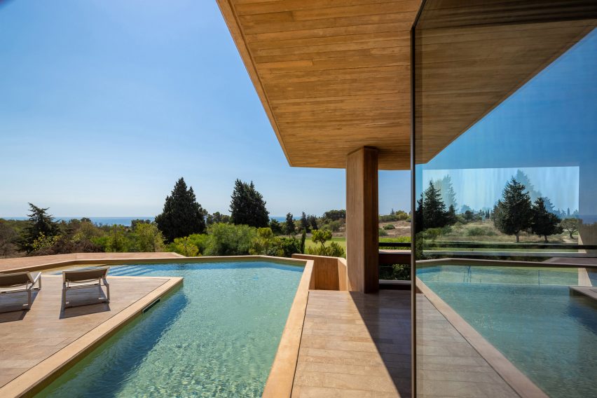 Glazing and pool of Villa 19 at Palmares Ocean Living & Golf resort by RCR Architectes