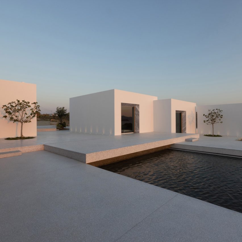 Paros House is comprised of white cubic volumes