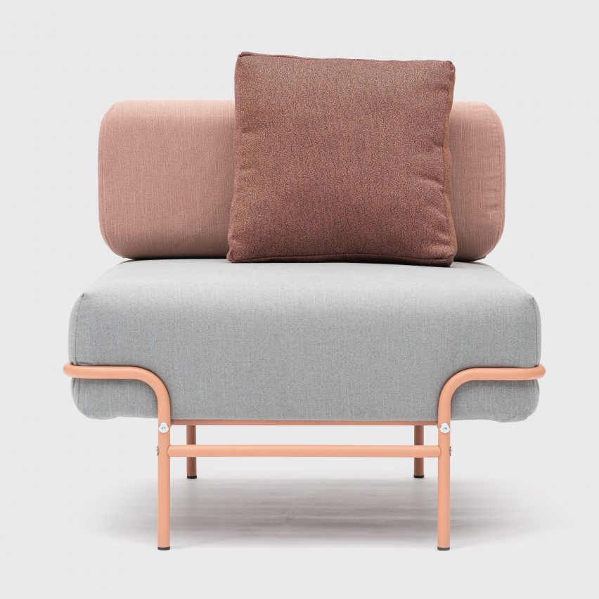 A Tangens chair with gray and pink textile seat cushions, presented at Maison & Objet