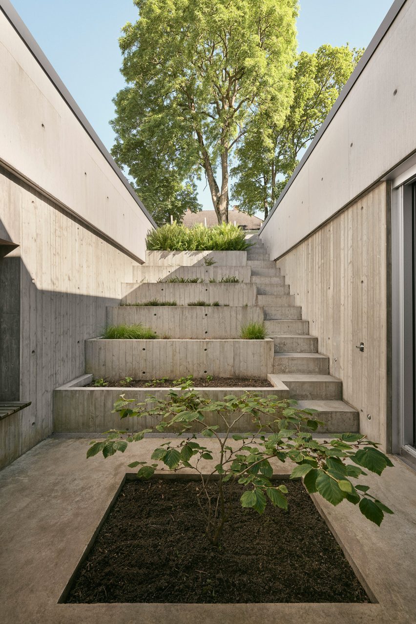 Concrete courtyard in Villa Aa