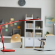 A photograph of the Z-Bar Gen 4 desk lamp in red