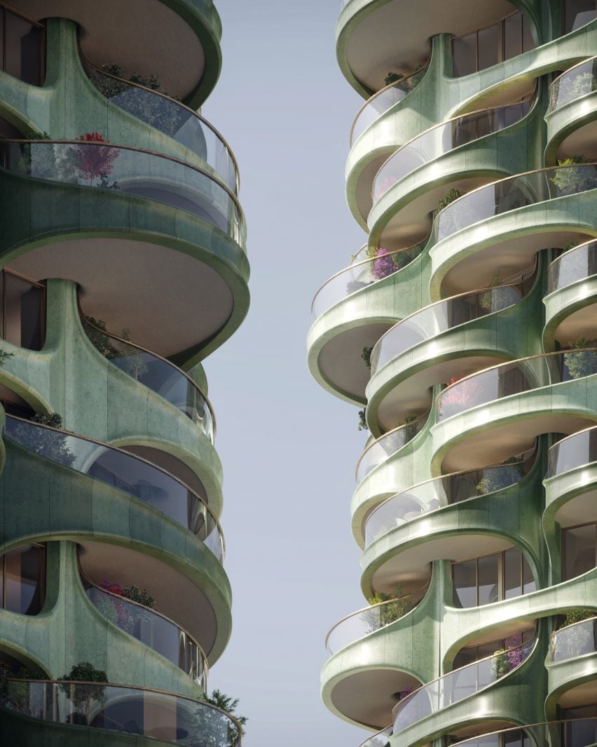 Towers with curved green balconies