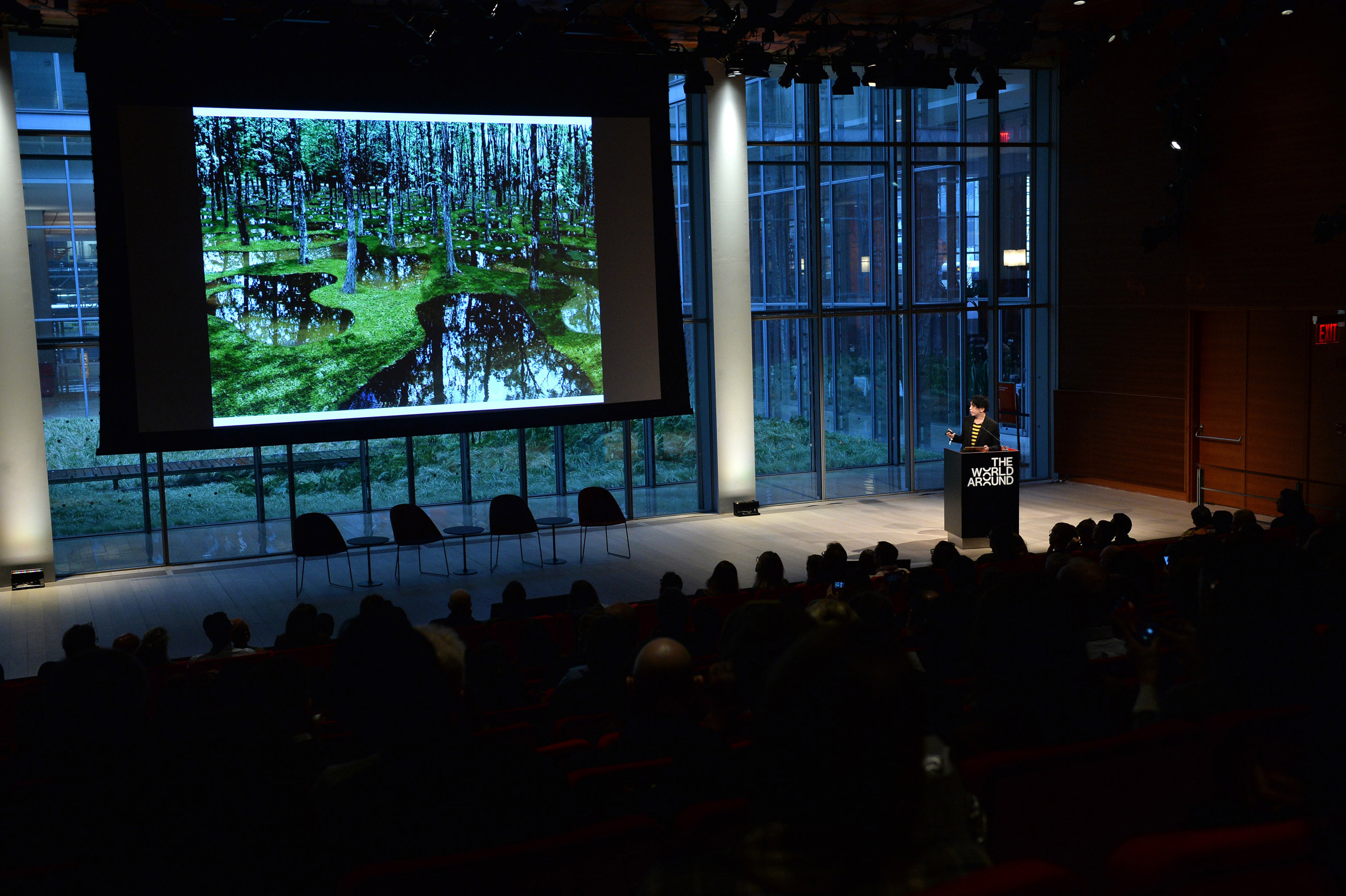 A photograph of architect Junya Ishigami speaking at The World Around