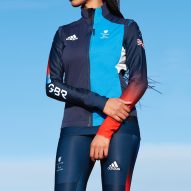 A woman wearing a jacket and leggings by Adidas