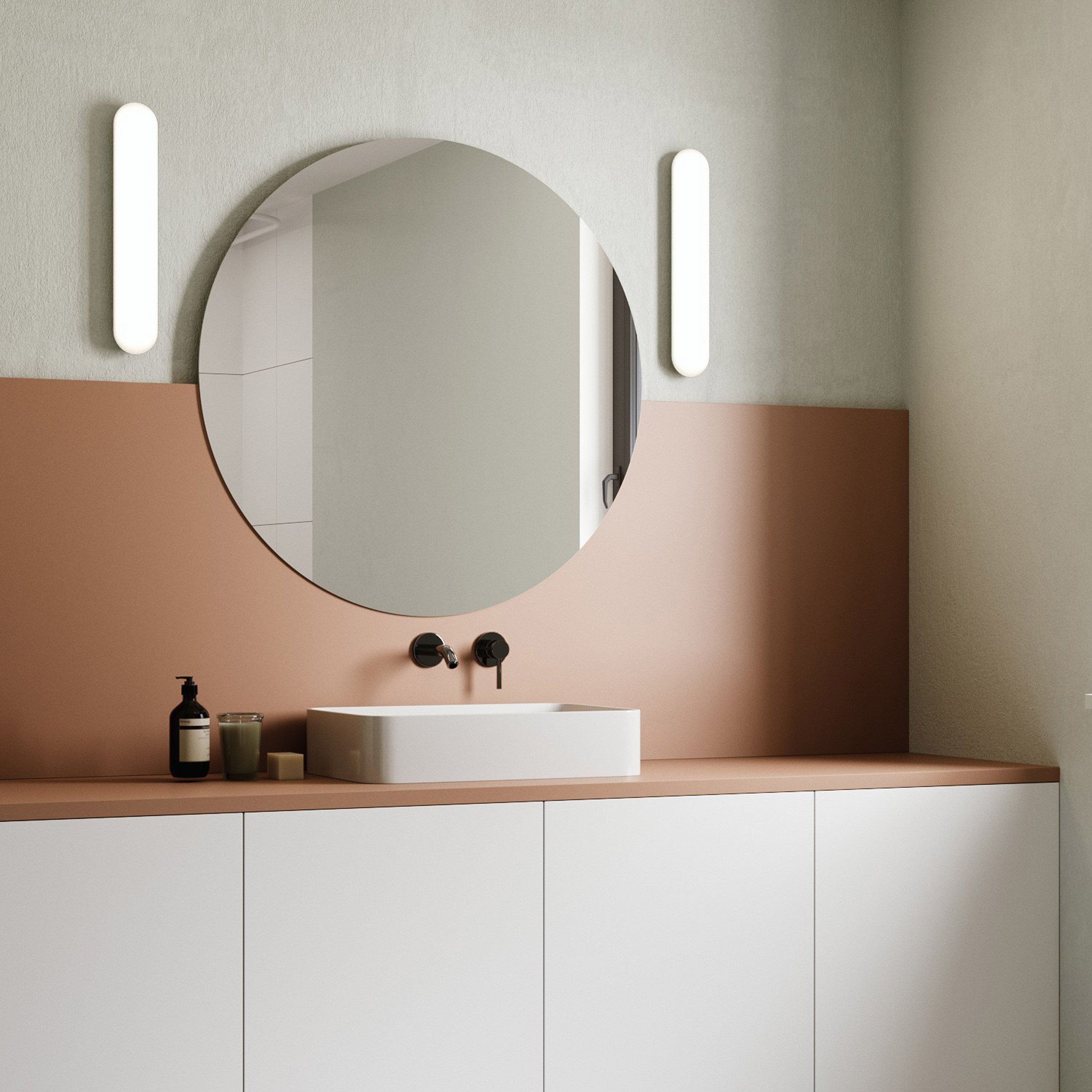 Altea wall light by Astro used in a pink and white bathroom