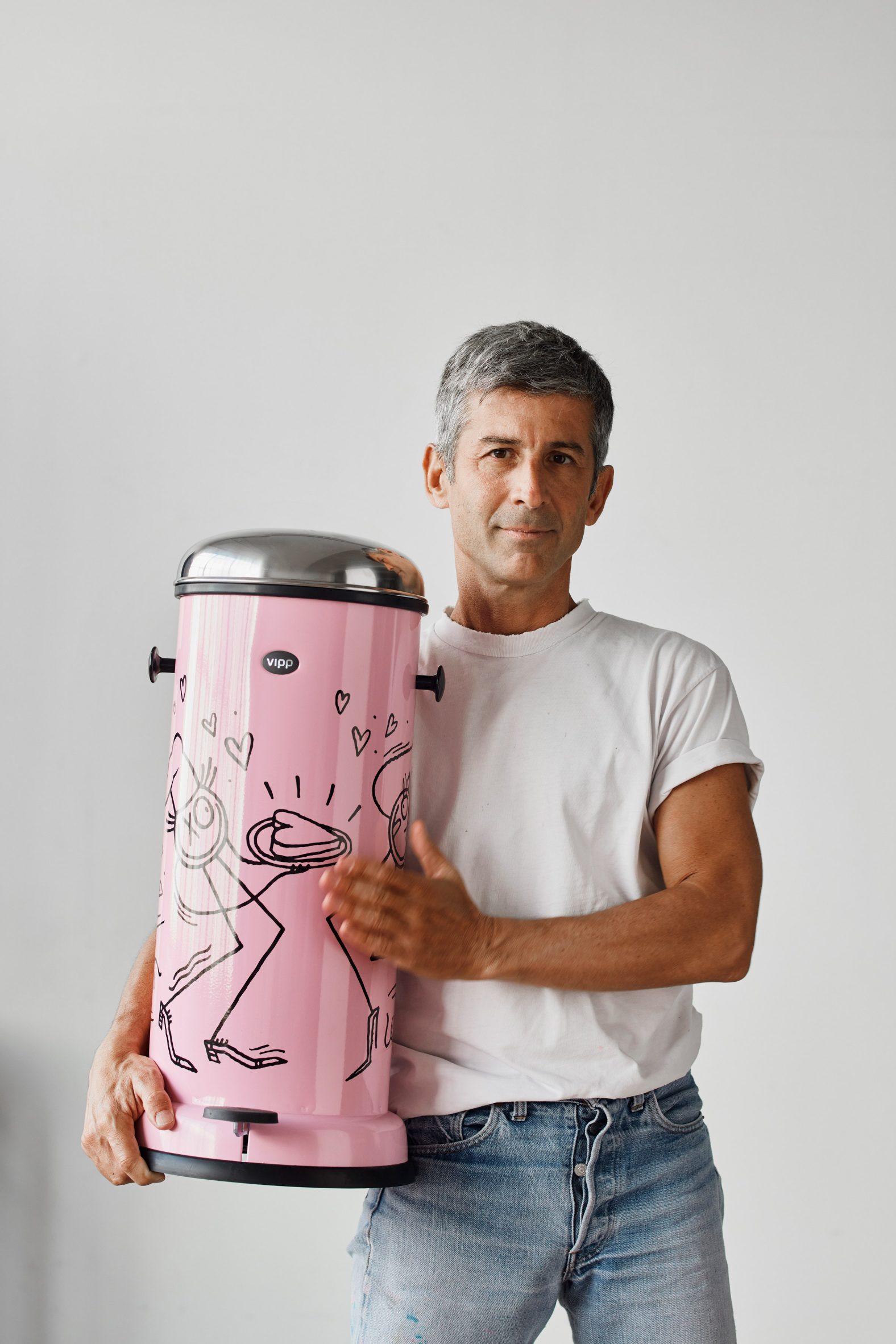 Andre Saraiva holding the Armour pink bin