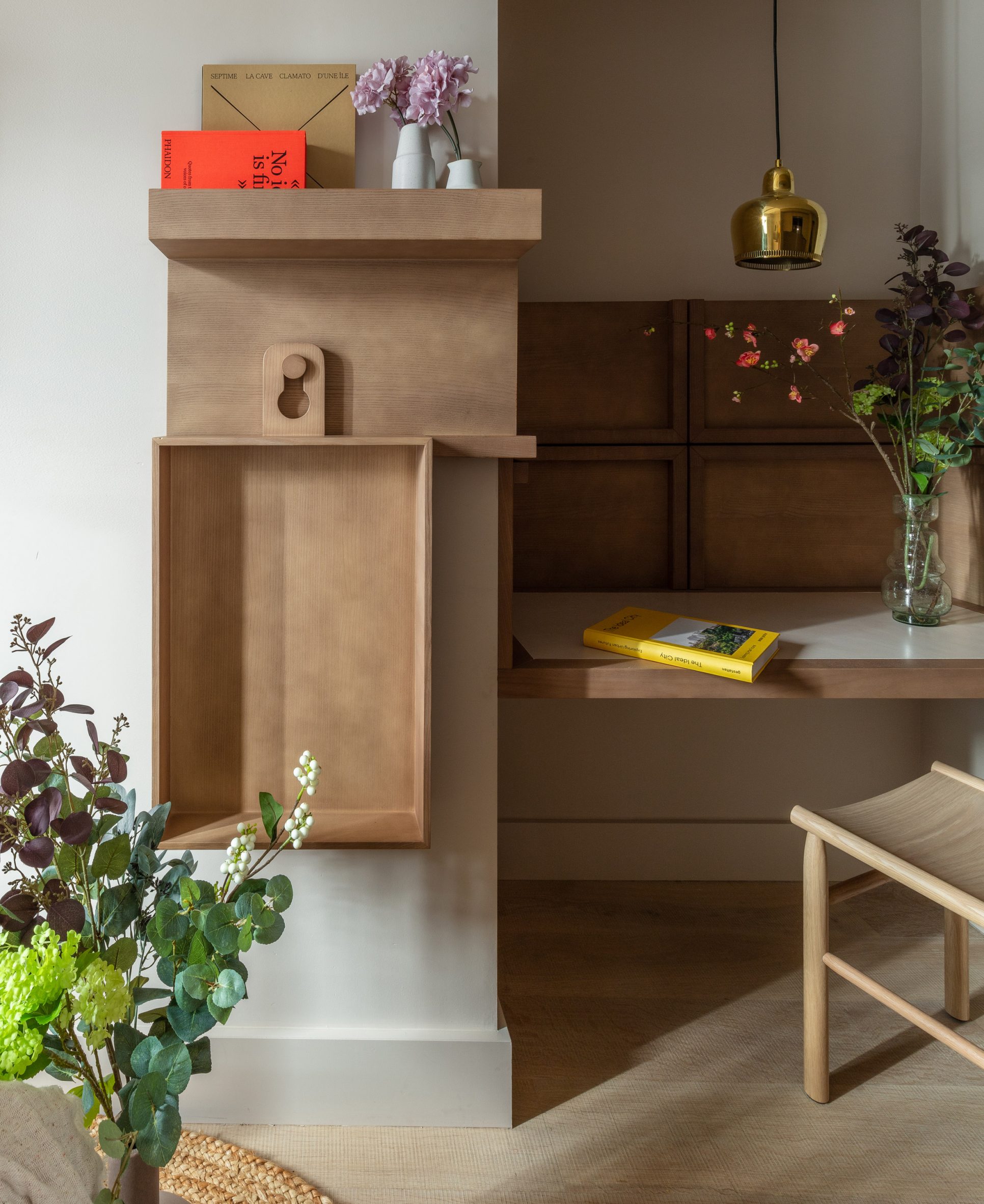 Desk and shelves in bedroom of Buckle Street Studios by Grzywinski+Pons for Locke hotels