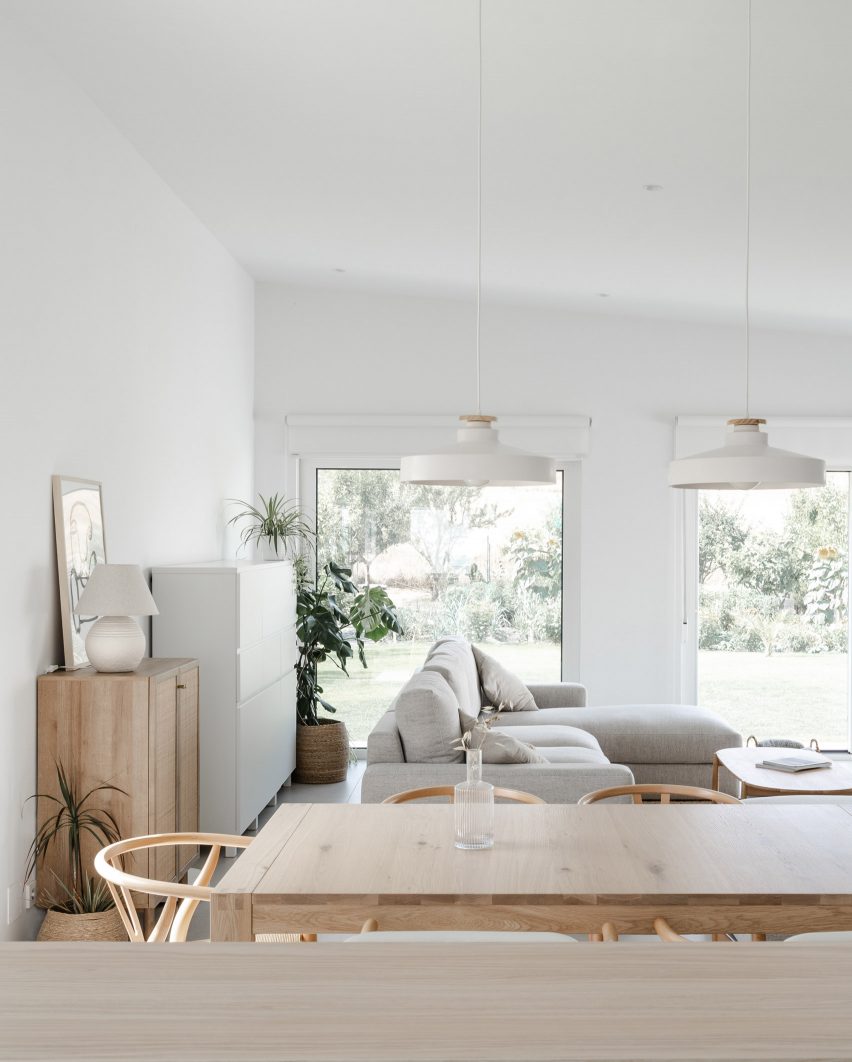 White-walled living room with wooden furniture