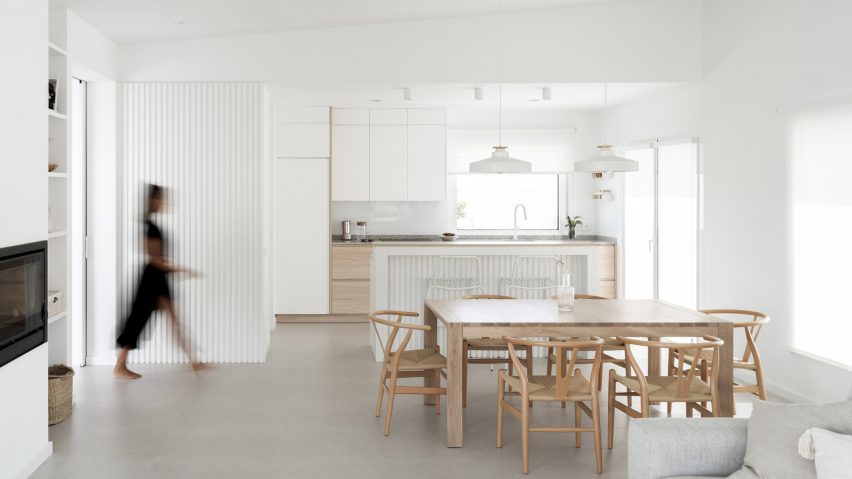 White-walled kitchen and dining room
