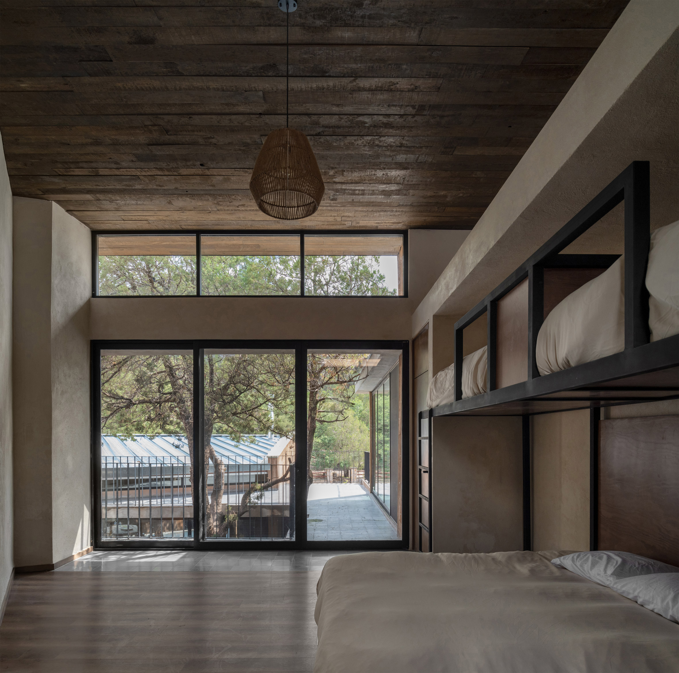 A minimalist bedroom inside Casa Majalca