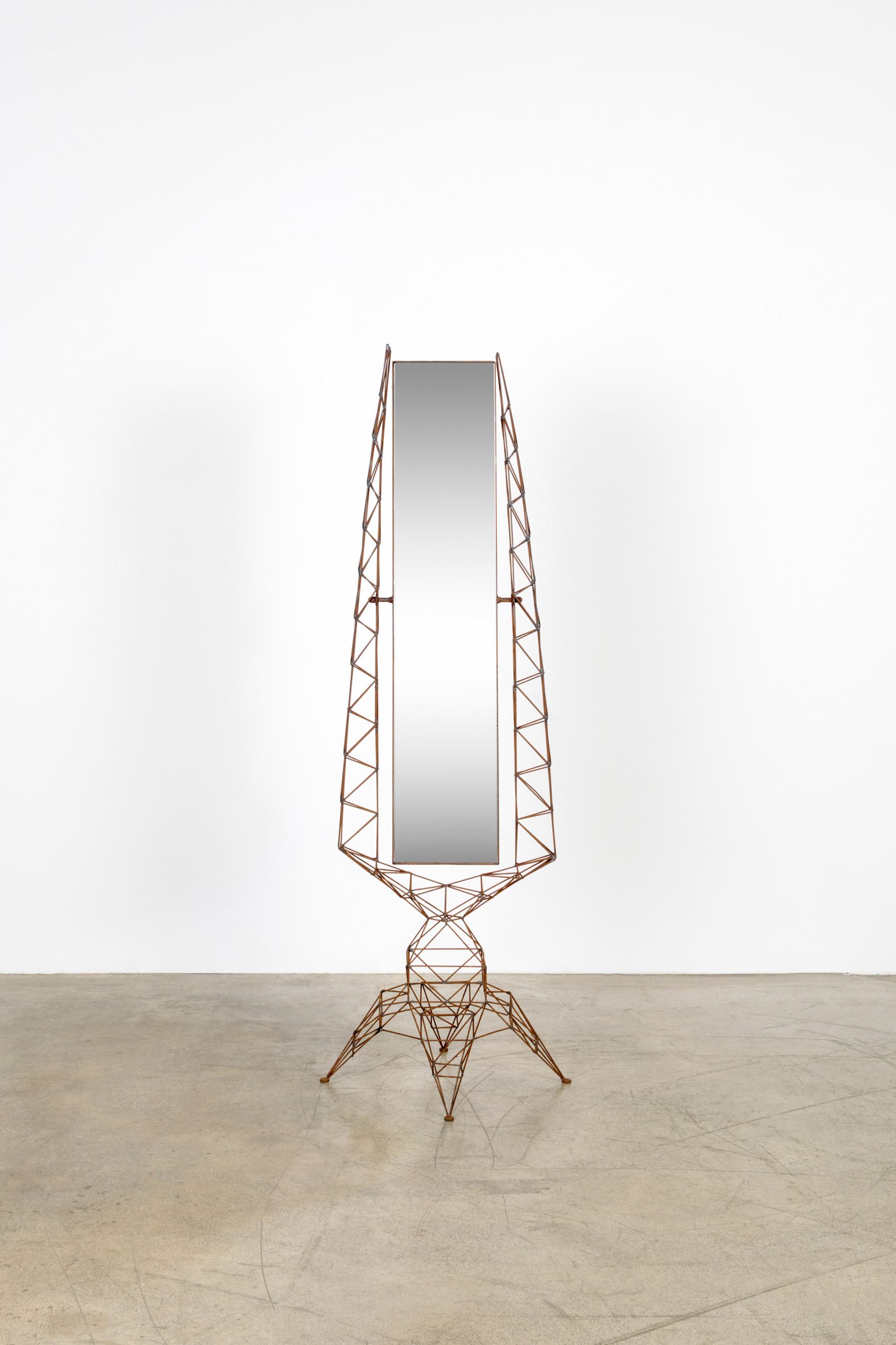 A mirror by Tom Dixon