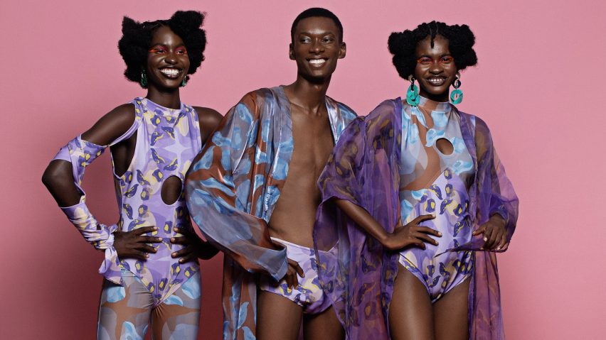 Three smiling models wearing blue and purple clothing by Orange Culture