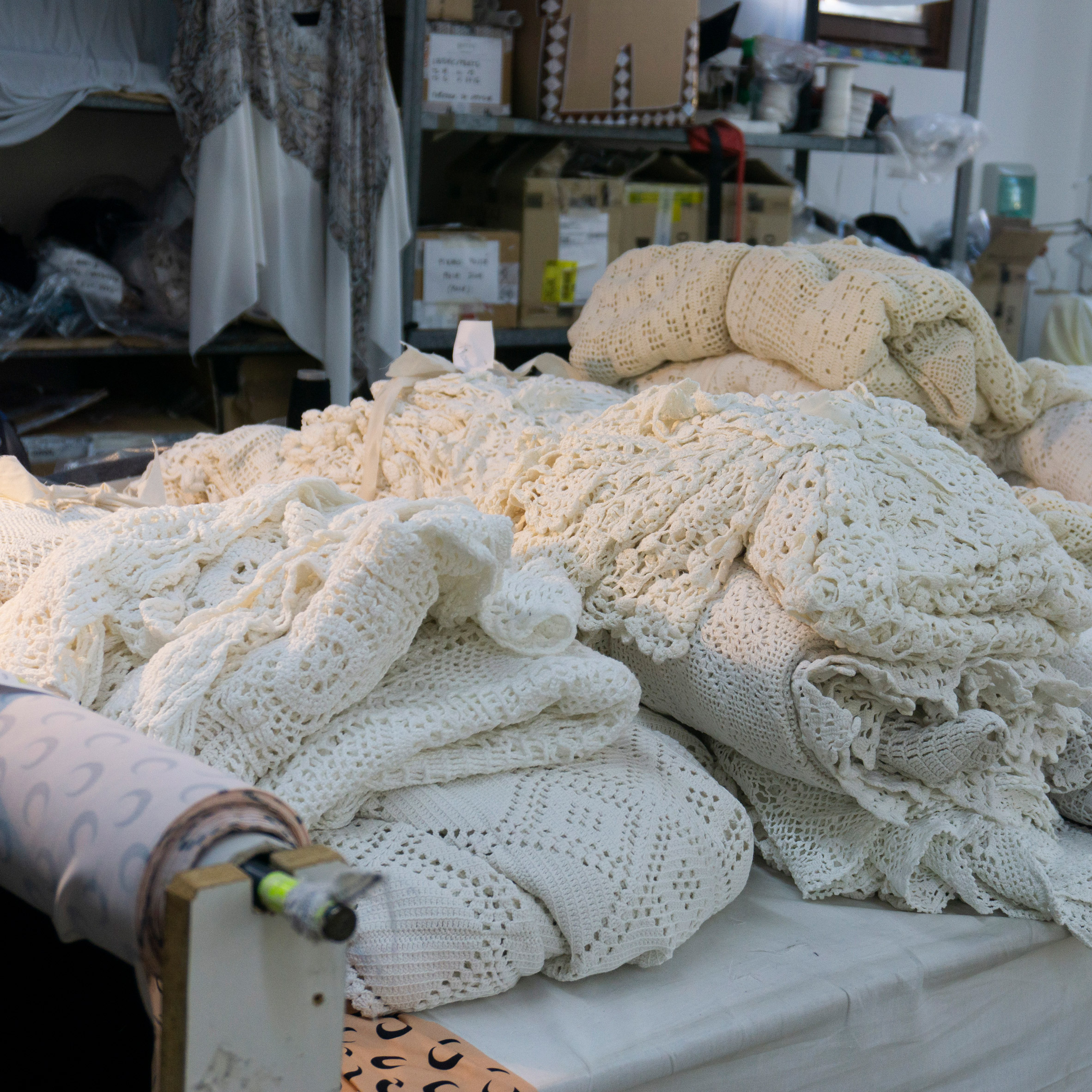 Pile of discarded household linens for turning into Marine Serre garments