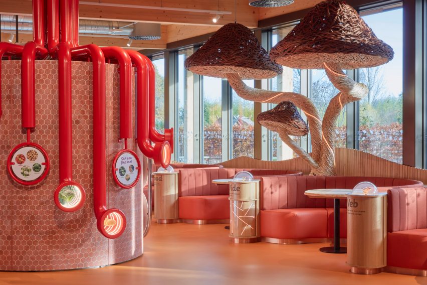 A colourful restaurant with mushroom sculptures