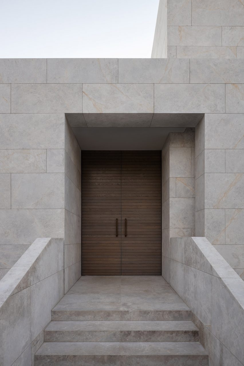 Marble-clad entrance to Grange Residence