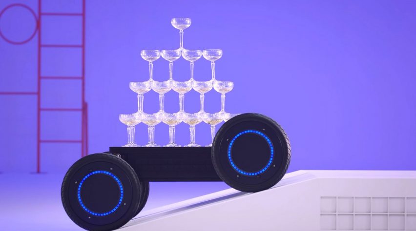 Hyundai Drive and Lift platform carrying pyramid of cocktail glasses without dropping them