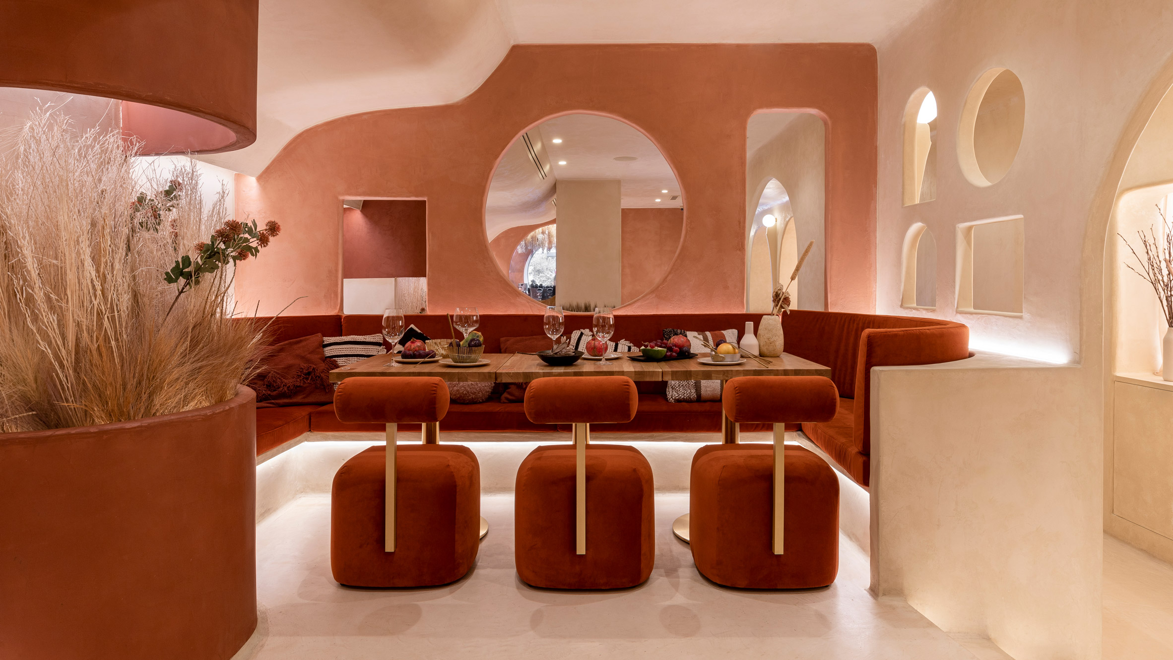 Masquespacio creates an adobe-inspired restaurant interior.