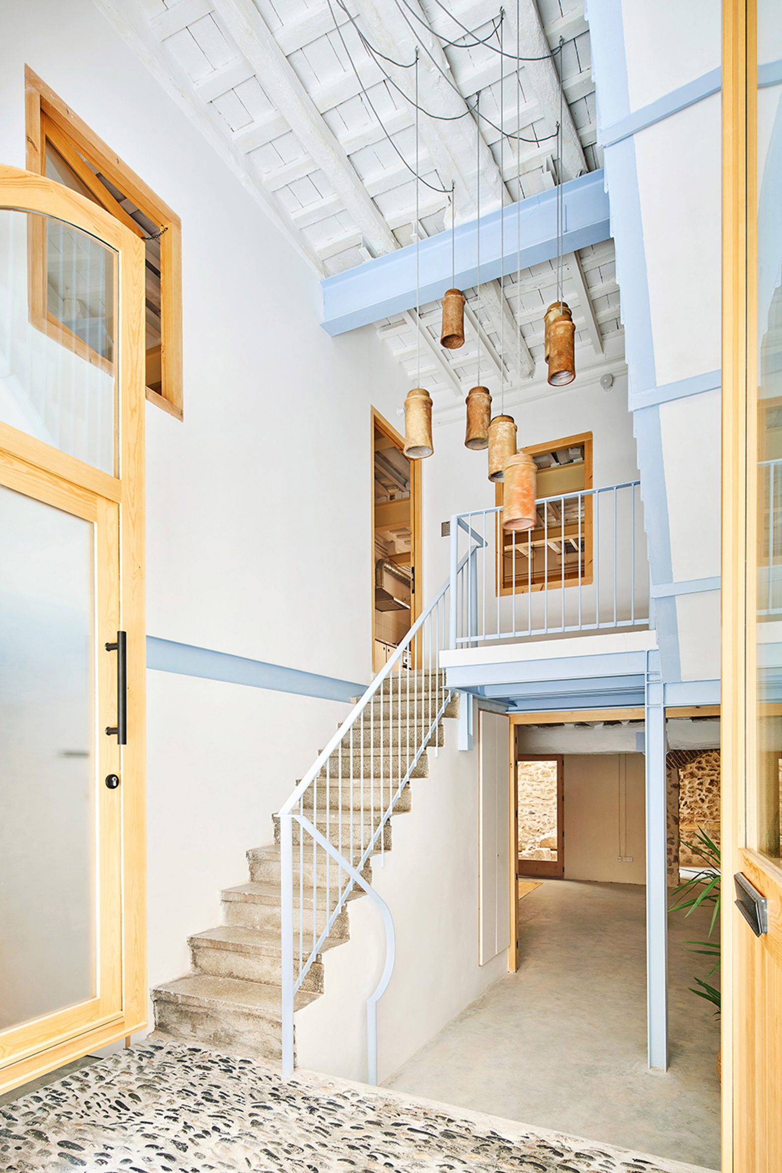 Stairwell with blue balustrades 