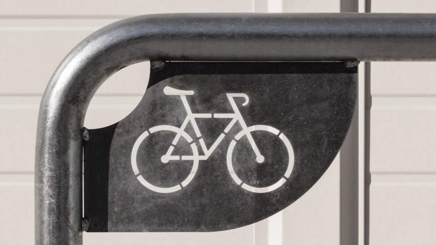 Bike symbol on a bike parking station as photographed by Pawel Czerwinski, illustrating a news story about the planned Cambio cycling network in Milan