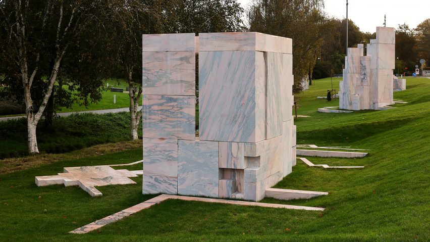 Two marble sculptures on grass