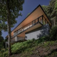 Triangular embeds PR House on a forested hillside in Chile